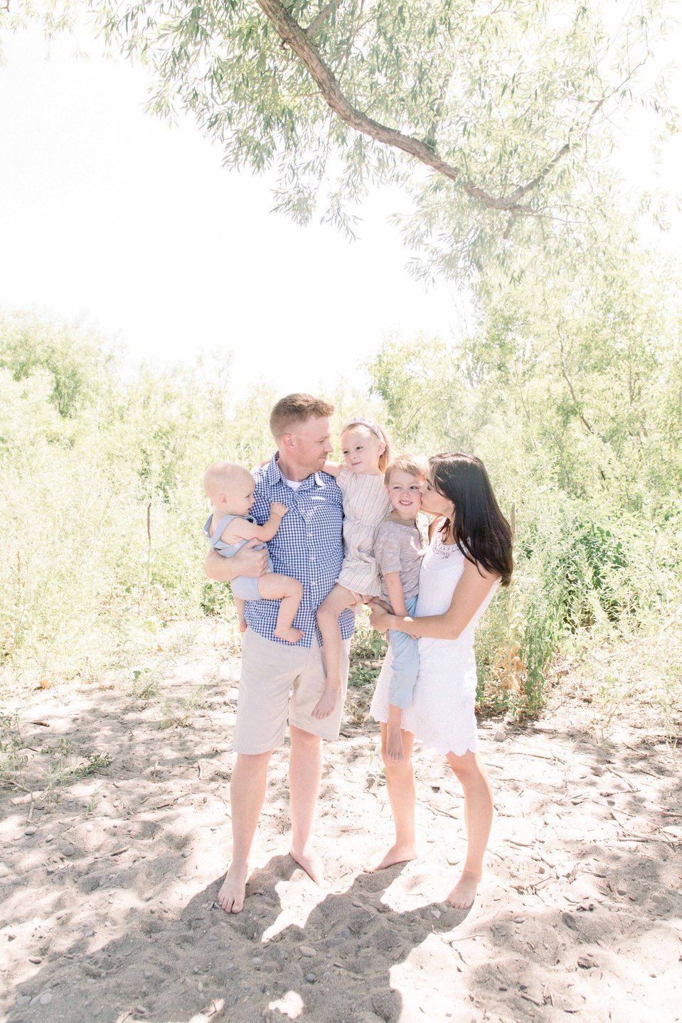 Portrait of family of five standing on the beach, Niagara portrait photographer, Niagara family photographer, portrait photography, family photography, candid photography, authentic photography, Emily VanderBeek Photography.