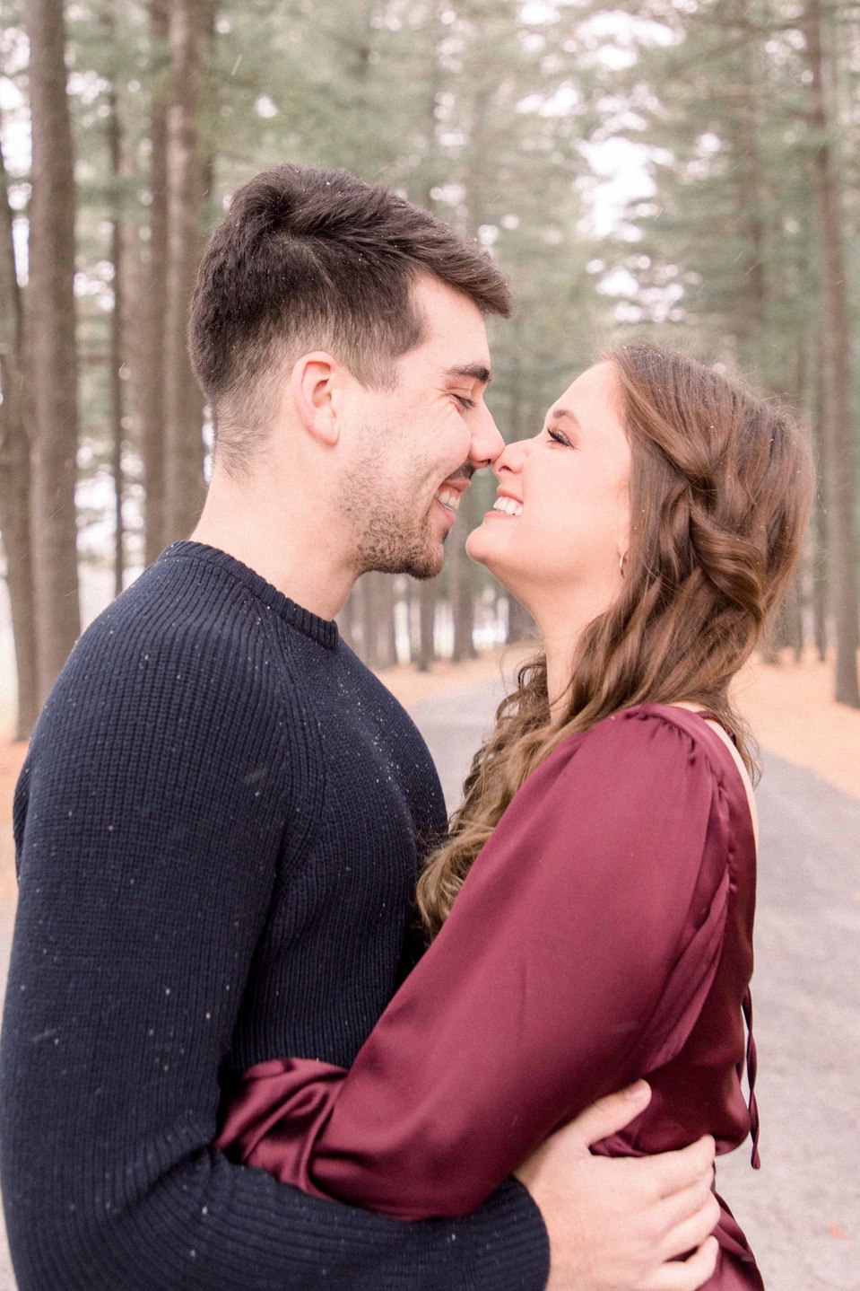 Portrait of young couple touching noses on a winter trail, Niagara family photographer, family photography, Niagara portrait photographer, portrait photography, Champlain photographer, Hawkesbury photographer, Emily VanderBeek Photography.
