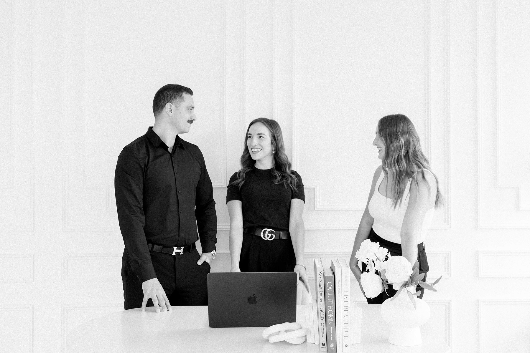 Black and white portrait of a Real Estate Team in a natural light studio in Ottawa. Branding Photography, Emily VanderBeek Photography, Ottawa Photographer, Ottawa Portrait Photographer, Candid Photography.