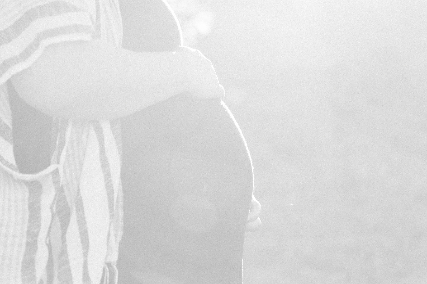 Black and white maternity photo of close up baby bump, Emily VanderBeek Photography, Portrait and Family photography, Niagara Photographer, Champlain Photographer, Vaudreuil-Soulanges Photographer, candid photography, authentic photography.
