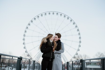 Montreal Engagement Photographer; Ferris Wheel Montreal portrait photo; Lucille and Max's winter engagement shoot; Montreal Pre-Wedding photographer; Old Montreal engagement photo session; Dog child
