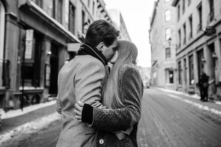Montreal Engagement Photographer; Ferris Wheel Montreal portrait photo; Lucille and Max's winter engagement shoot; Montreal Pre-Wedding photographer; Old Montreal engagement photo session; Dog child