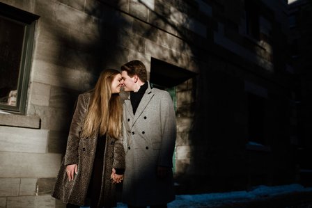 Montreal Engagement Photographer; Ferris Wheel Montreal portrait photo; Lucille and Max's winter engagement shoot; Montreal Pre-Wedding photographer; Old Montreal engagement photo session; Dog child