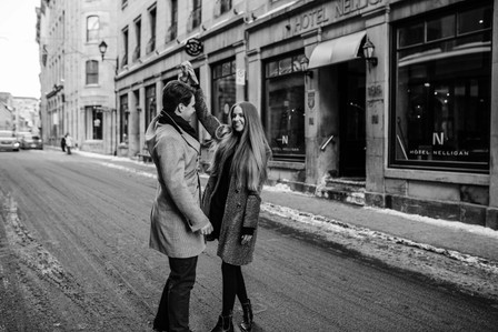 Montreal Engagement Photographer; Ferris Wheel Montreal portrait photo; Lucille and Max&amp;amp;#x27;s winter engagement shoot; Montreal Pre-Wedding photographer; Old Montreal engagement photo session; Dog child