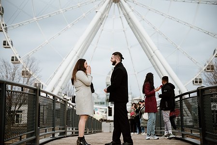 Hana and Nick's Montreal surprise proposal photographer; John KOO Photography; MTL surprise marriage proposal photo; Old Montreal Ferris Wheel surprise proposal; surprise proposal photography Old Montreal