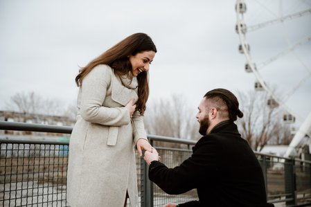 Hana and Nick's Montreal surprise proposal photographer; John KOO Photography; MTL surprise marriage proposal photo; Old Montreal Ferris Wheel surprise proposal; surprise proposal photography Old Montreal