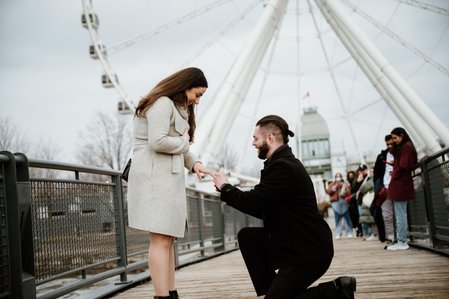 Hana and Nick's Montreal surprise proposal photographer; John KOO Photography; MTL surprise marriage proposal photo; Old Montreal Ferris Wheel surprise proposal; surprise proposal photography Old Montreal
