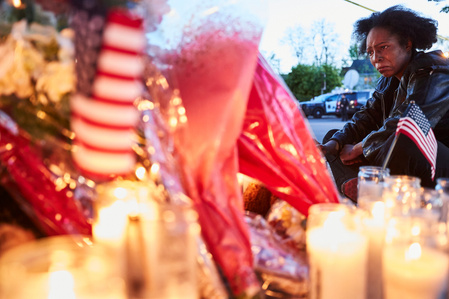 Kicia “Coldspring’ mourns in front of a memorial outside Tops Friendly Market honoring the 10 mass shooting victims in Buffalo, N.Y. on May 17, 2022. She cried out, “ It’s never gonna stop, it’s never ever gonna stop,” speaking about the numerous racially