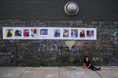 Mural of the 10 lives lost near Tops on Jefferson Ave in Buffalo, N.Y. on May 20, 2022. (Mustafa Hussain for The New York Times)