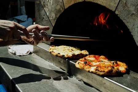 Oven pizzas being made during a street festival in Chicago Illinois. 