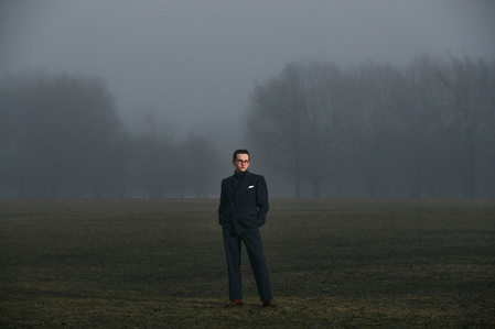 Environmental portrait of Zoë Vulgamott surrounded by fog in Chicago Illinois. 
