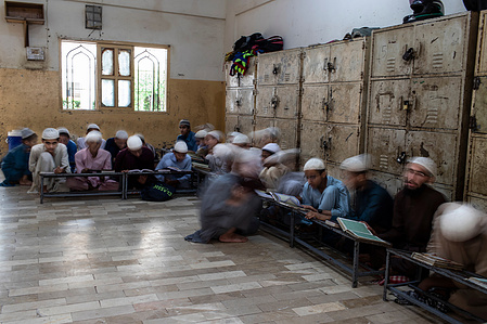 Students at Jamia Binoria Al Alamia take their first exam of the year on Sunday Oct 6, 2019 in Karachi, Pakistan. Established in 1978, Jamia Binoria is an internationally accredited Islamic university with students from over 40 countries. The three-hour l