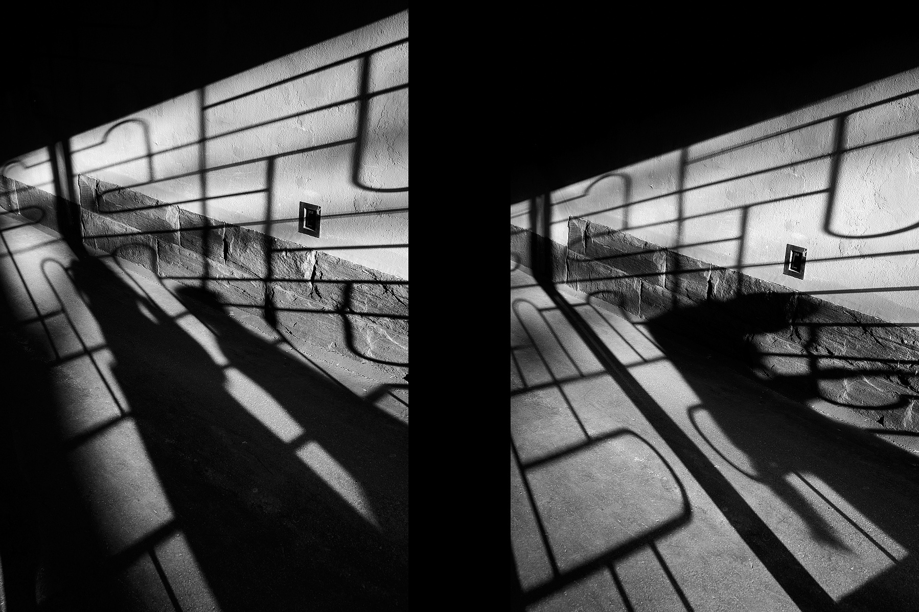 Silhouettes of people and gate grill walking past the gate in Töölö, Helsinki