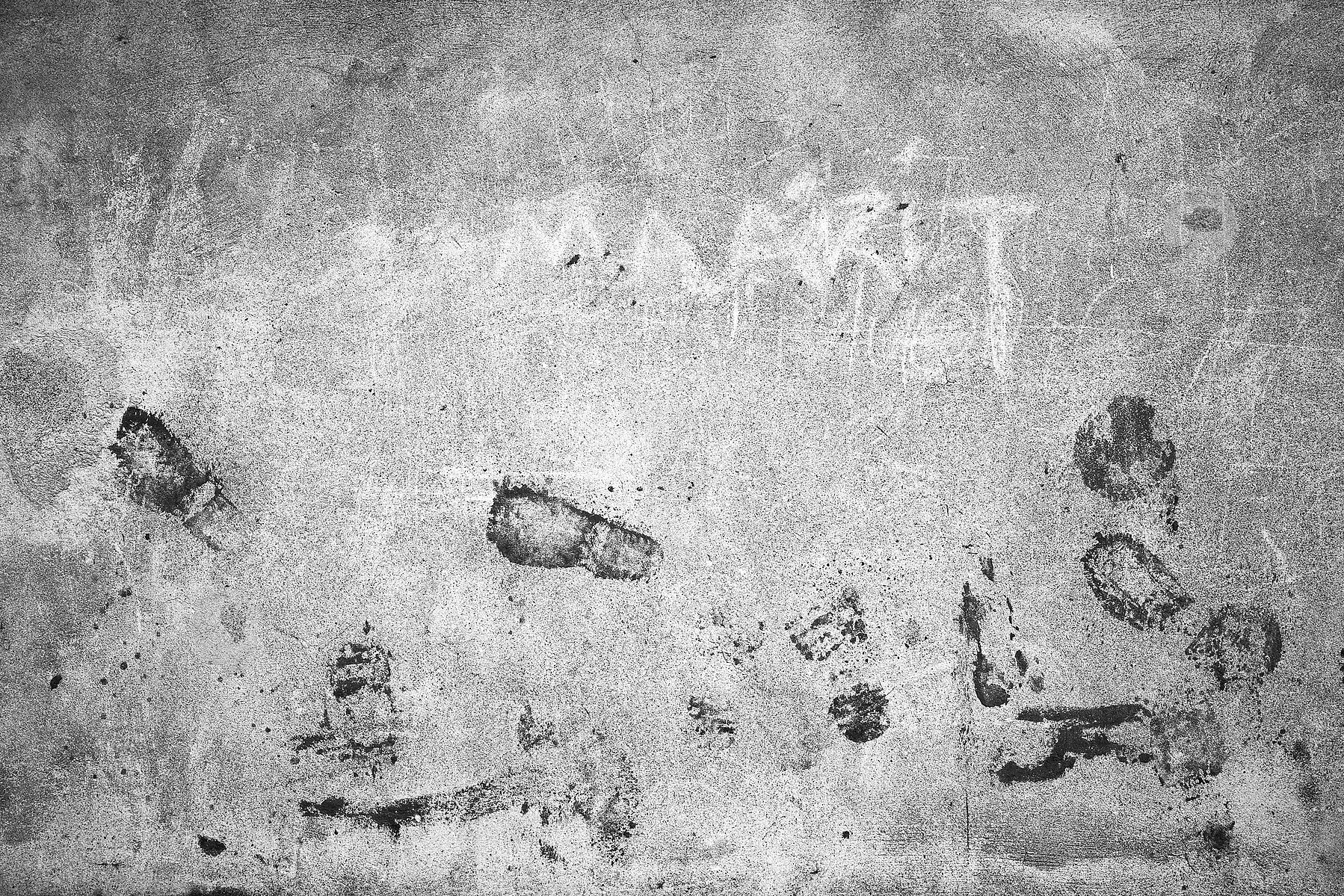 Unruly and dirty footprints on a school wall