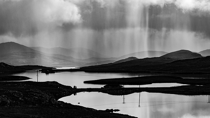 Rain and hailstones over the lochs of the Isle of Lewis, Outer Hebrides, Scotland