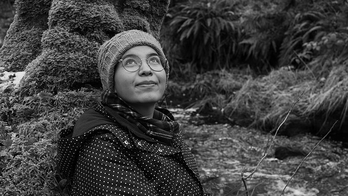 Farzana, an Afghan refugee finding solace on the banks of Bayhead River, Stornoway, Isle of Lewis, Outer Hebrides, Scotland.