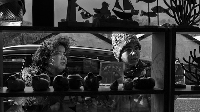 Frishta and her sister Farzana, both Afghan refugees shopping in Stornoway, Isle of Lewis, Outer Hebrides, Scotland.