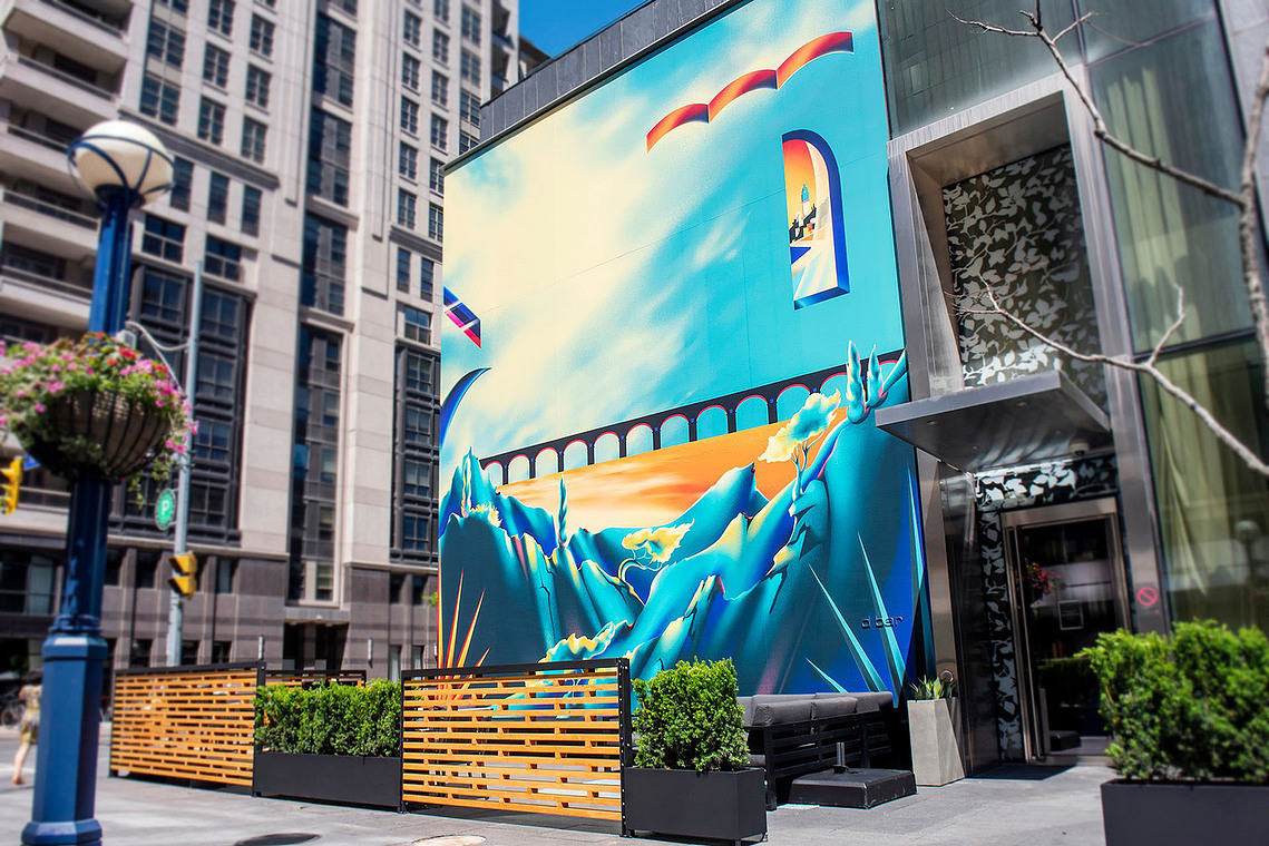 A Mediterranean inspired blue mural artwork in Toronto.