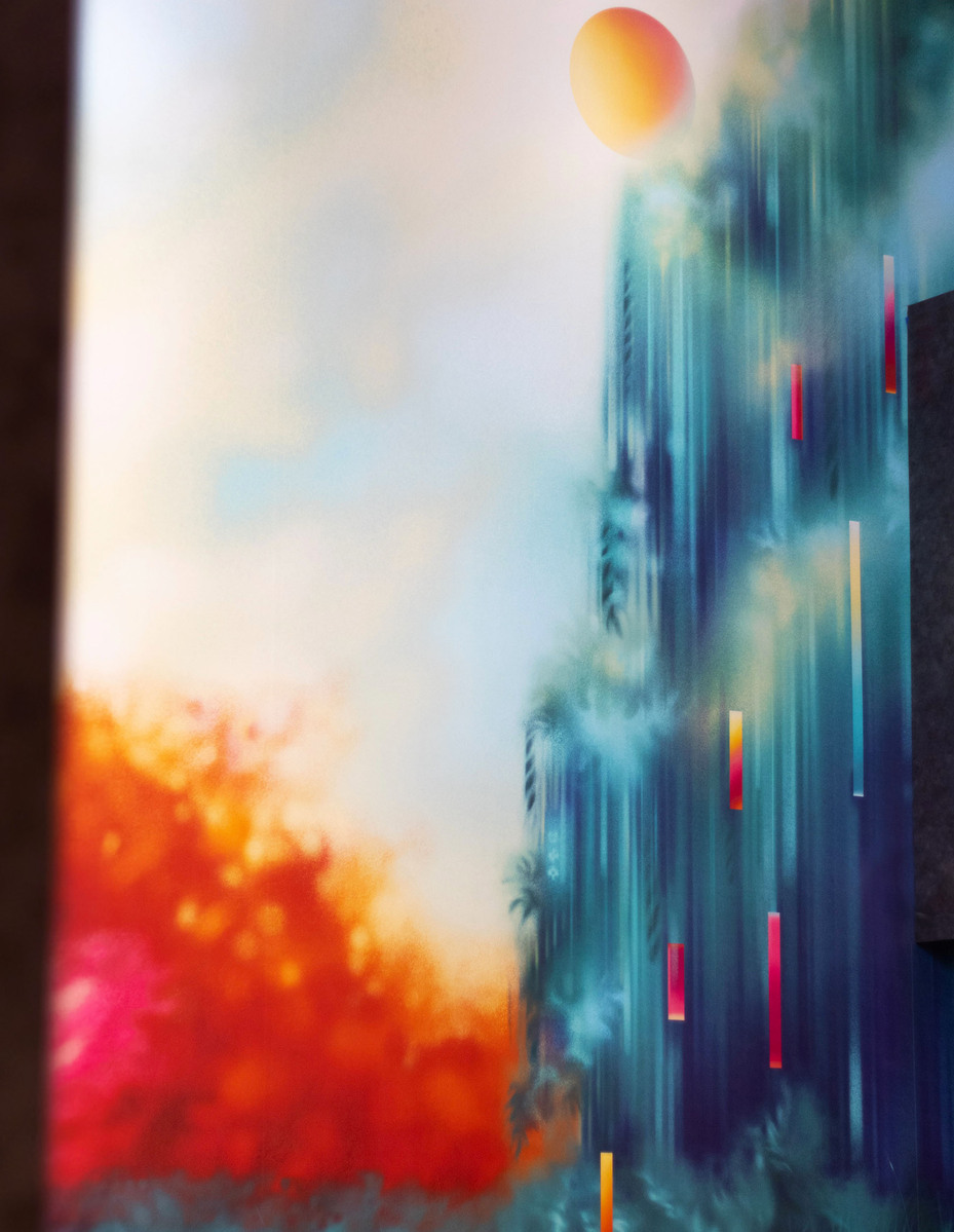 A colourful and bright mural artwork in a condo lobby.