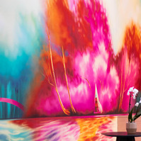 A colourful and bright mural artwork in a condo lobby.