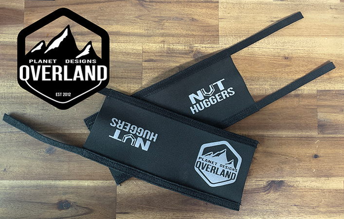 Nut Huggers designed for caravan awning arm locking knob are designed by Planet Designs Overland made in Australia. 2 Black Edition Nut Huggers are pictured.
