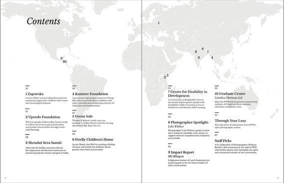 A spread from a Photographers Without Borders magazine of the table of contents, with a map of the world.