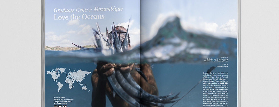 A spread from the Photographers Without Borders magazine, showing a photograph of a Black person holding a bunch of fish under water. Text is overlaid on the photo.