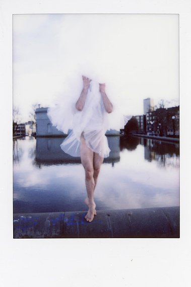 Quinn Hallenbeck dances the Sleeping Beauty; a dancer with tutu in her face, ballerina floating on water.