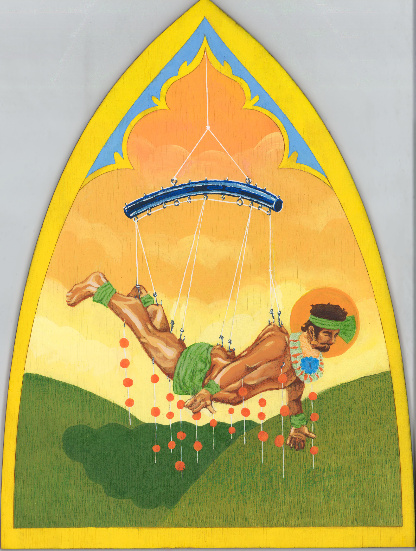 Indian man hangs in hook suspension from a curved beam. He wears a green cloth, headband, and ankle wraps. Oranges hang from threads hooked throughout his body. Behind him are green hills and a yellow-orange sky. Arched panel is yellow with blue accents.
