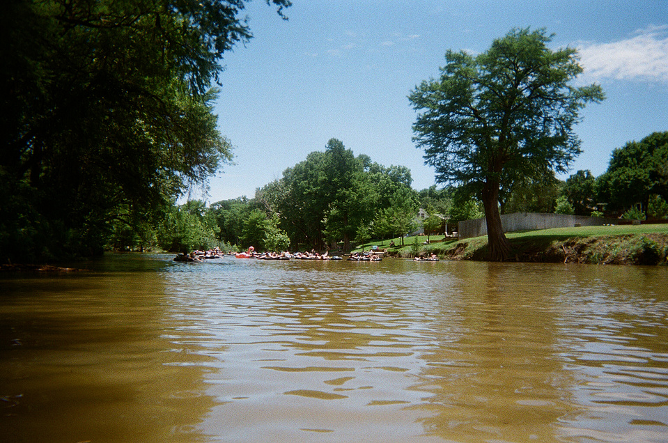 The Comal River, New Braunfels, TX. Point of view is from an innertube, on a day spent floating.
