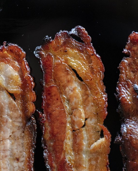 The Unofficial Yellowstone Cookbook by Jackie Alpers. Recipe photo of Hot Honey Bacon. 