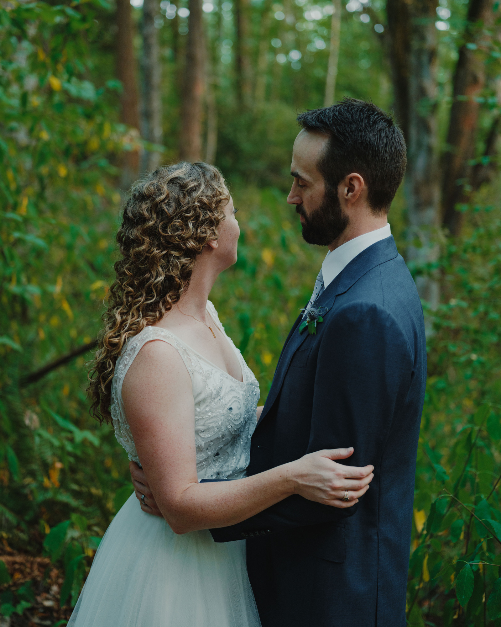 Intimate photography of the couple, minutes after their ceremony completes in Kenmore, Washington