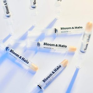 Bloom &amp;amp; Halo skinshot serums scattered with strong lighting and shadows. Photographed and styled by cosmetic photographer Tom Hargreaves in his studio in Exeter, Devon