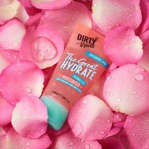 Dirty Works The Great Hydrate moisturiser lying in a bed of rose petals. Photographed and styled by cosmetic photographer Tom Hargreaves in his studio in Exeter, Devon