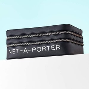 Black Net-A-Porter makeup bag. Photographed and styled by cosmetic photographer Tom Hargreaves in his studio in Exeter, Devon