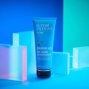 Superfacialist Hyaluronic acid anti-ageing day moisturiser in a matching blue themed set with neon lighting &amp;amp; acrylics. Photographed and styled by cosmetic photographer Tom Hargreaves in his studio in Exeter, Devon