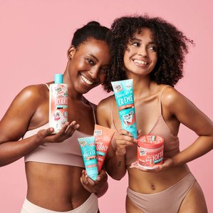 Two models holding a variety of Dirty works products. Photographed and styled by cosmetic photographer Tom Hargreaves in his studio in Exeter, Devon