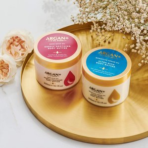Argan+ body butters on gold tray and marble table top. Photographed and styled by cosmetic photographer Tom Hargreaves in his studio in Exeter, Devon
