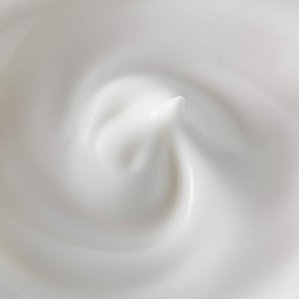 Closeup of skin day cream from above. Photographed and styled by cosmetic photographer Tom Hargreaves in his studio in Exeter, Devon