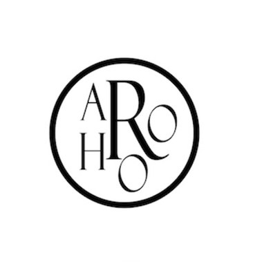 A circle with the letters AROHO inside it form A Room of Her Own's logo image.