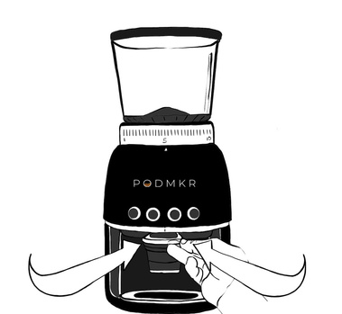 Illustration showing a hand pulling out the Podmkr gadget to fill it with coffee grounds. This image highlights the user-friendly design for easy filling and preparation of coffee.