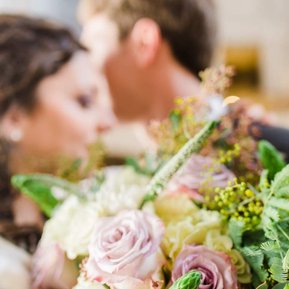 A bride and groom hug following their intimate San Francisco City Hall wedding