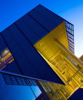 Exterior night photo of BAnQ grande bibliothèque in Montreal