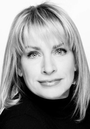 Individual corporate portrait of a woman, in black and white 