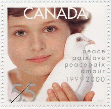 Postal stamp issued at the turn of the century showing a kid and a dove to portray the theme of world peace