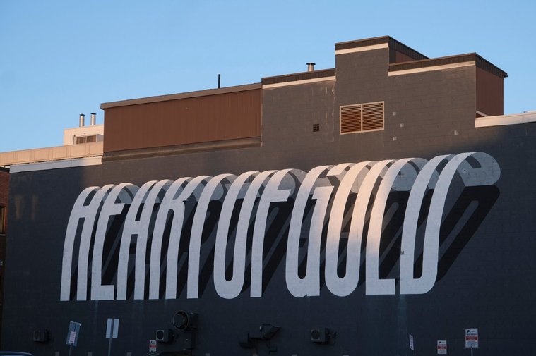Art mural text that says Heart of Gold in Larch St. Sudbury