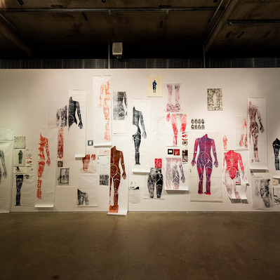 Temporal abruptions: making and unmaking the body, wall collage installation, lino prints on paper, text prints, monotypes, photocopies, notes, 2018-2020. Photograph by Rosina Possingham.