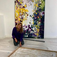 Irma Hameri setting up her personal exhibition " Flowers" in Gallery G12, Finland, 2019
