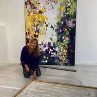 Irma Hameri setting up her personal exhibition " Flowers" in Gallery G12, Finland, 2019