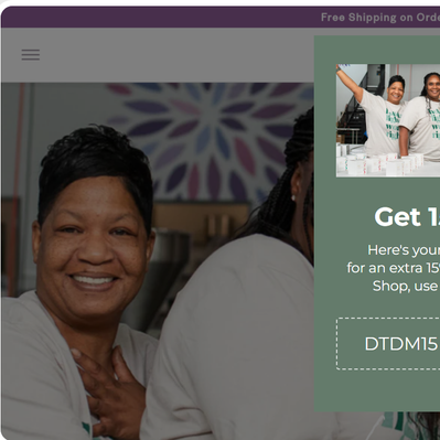 Pop-up that appears on the homepage. Features our survivors in our holiday t-shirt with a promotional message of 15% off your order.